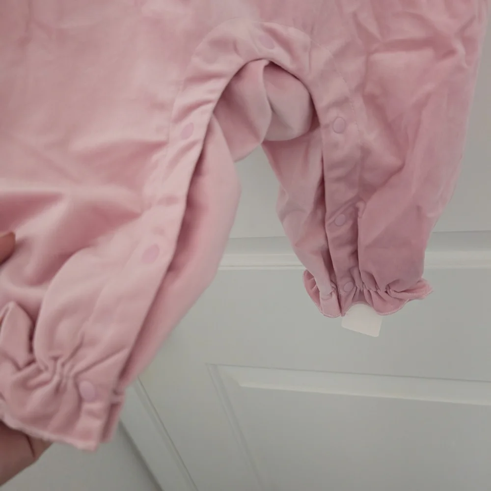 $ Pink Velour Jumpsuit With‎ Ruffle And Lace Bow Detail